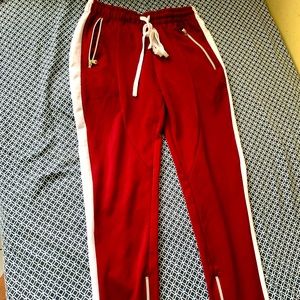 Jogger with zip on each sides fits 34-36 
Med